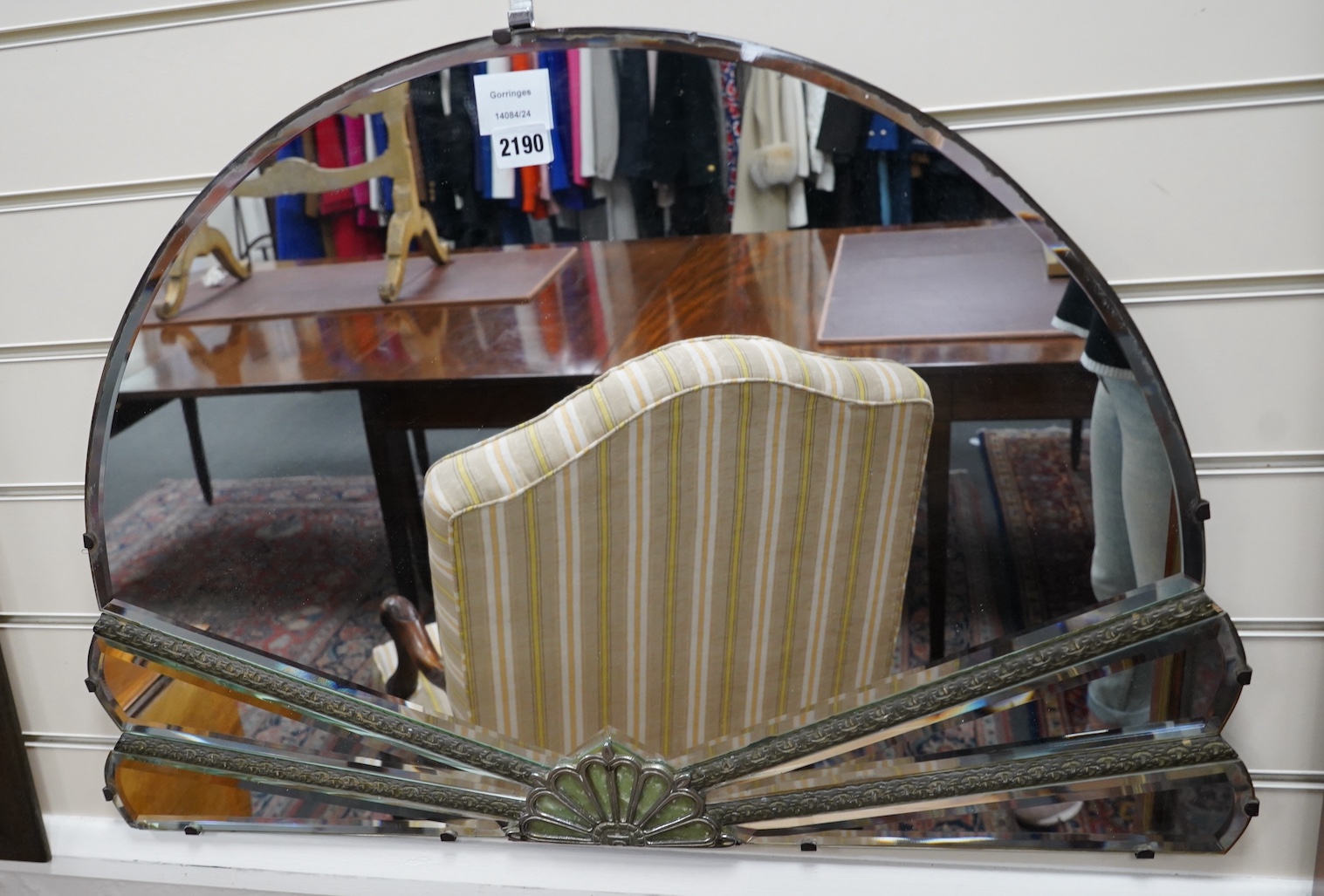 An Art Deco style wall mirror, width 78cm, height 52cm. Condition - fair